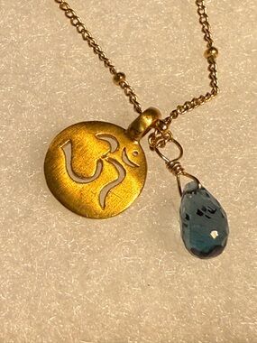 Satya Jewelry Gold OM Necklace with Teal Gem Drop